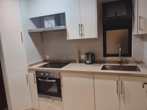 Kitchen, همس المدى للشقق المخدومه in Al Hofuf Kitchen, همس المدى للشقق المخدومه in Al Hofuf