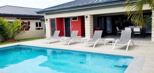 Swimming pool, Private 4BR-5 Bath Luxury Villa with Pool in Gated Community near beaches in Bon Accord Village Swimming pool, Private 4BR-5 Bath Luxury Villa with Pool in Gated Community near beaches in Bon Accord Village