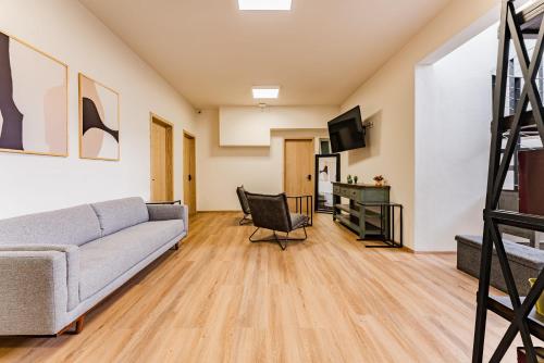 Lounge/area TV in comune, Escandon Suites by Escajal Rooms near Museo dei Bambini Papalote Lounge/area TV in comune, Escandon Suites by Escajal Rooms near Museo dei Bambini Papalote