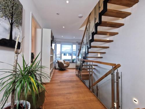 Kilátás, BohnApartments Luxury City-Villa Hauptstadtblick-WLAN-Garten-Parkplätze (BohnApartments Luxury Villa Berlin - 210qm - Wintergarten - Kamin - 4 kostenlose Parkplatze - 6 Schl) in Birkenwerder Kilátás, BohnApartments Luxury City-Villa Hauptstadtblick-WLAN-Garten-Parkplätze (BohnApartments Luxury Villa Berlin - 210qm - Wintergarten - Kamin - 4 kostenlose Parkplatze - 6 Schl) in Birkenwerder