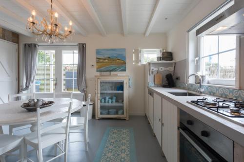кухня, Zeayou Zeeland - Appartementen Brouwerijweg 43 in Домбург кухня, Zeayou Zeeland - Appartementen Brouwerijweg 43 in Домбург