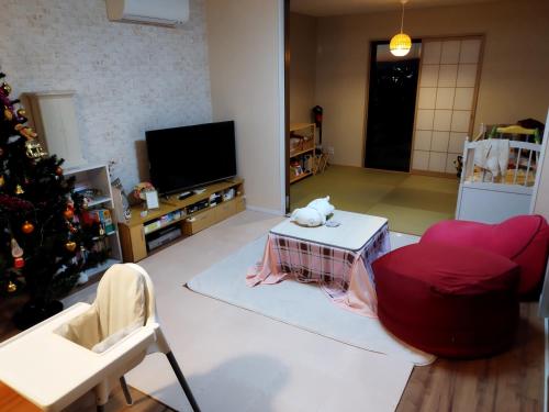 Shared lounge/TV area, IIIホーム in Daito Shared lounge/TV area, IIIホーム in Daito