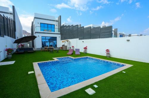 Garden, Al Bandar Luxury Villa with 5BHK with private pool in Fujairah Garden, Al Bandar Luxury Villa with 5BHK with private pool in Fujairah