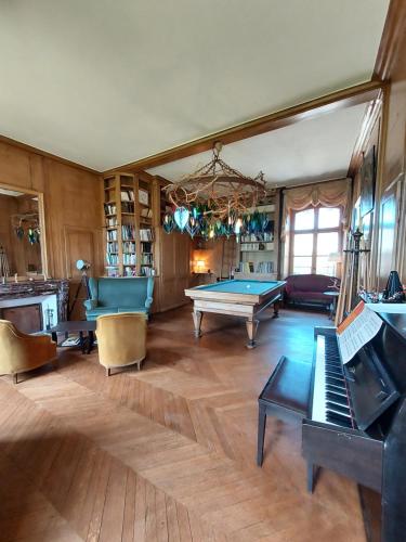 Közös társalgó / TV, Les Chambres du Chateau du Rozel in Les Pieux Közös társalgó / TV, Les Chambres du Chateau du Rozel in Les Pieux