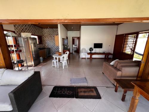 Shared lounge/TV area, Casa Sao Miguel dos Milagres in Pontal da Barra Shared lounge/TV area, Casa Sao Miguel dos Milagres in Pontal da Barra