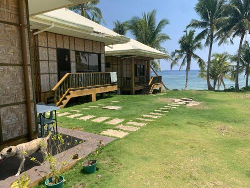 Villa Malinao Oceanview Resort - Deluxe bungalow in บูร์โกส Villa Malinao Oceanview Resort - Deluxe bungalow in บูร์โกส