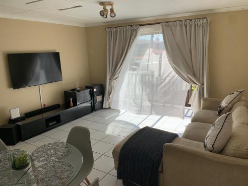 Shared lounge/TV area, Birdview eye in Southernwood Shared lounge/TV area, Birdview eye in Southernwood