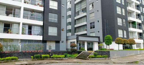 Bejárat, Like a Home with Balcony - 7Th FLOOR - Parking - Gym in El Giron Bejárat, Like a Home with Balcony - 7Th FLOOR - Parking - Gym in El Giron