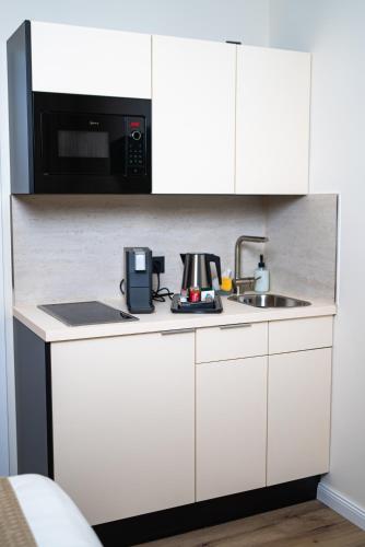 Cocina, Julys Apartment Nr 3 in Oberhausen City Center Cocina, Julys Apartment Nr 3 in Oberhausen City Center