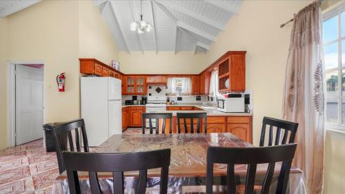 Kitchen, Your roomy comfortable place K4 near Maurice Bishop International Airport Kitchen, Your roomy comfortable place K4 near Maurice Bishop International Airport