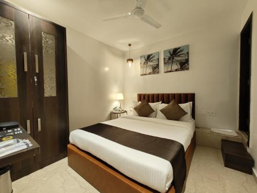 Ágy, The Majlis Hotel - Near Taj Hotel Colaba Mumbai near Jehangir Galéria Ágy, The Majlis Hotel - Near Taj Hotel Colaba Mumbai near Jehangir Galéria