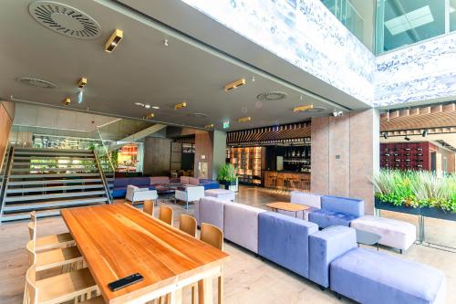 gedeelde lounge/tv-ruimte, ibis Styles Sibiu Arsenal in Sibiu gedeelde lounge/tv-ruimte, ibis Styles Sibiu Arsenal in Sibiu