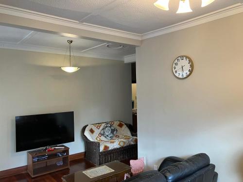 jaettu olohuone/TV alue, Wellington single bedroom in North Wellington jaettu olohuone/TV alue, Wellington single bedroom in North Wellington