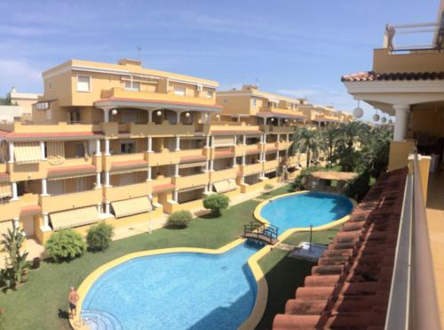 Úszómedence, Apartamento con terraza de 100m2 in Les Marines Beach Úszómedence, Apartamento con terraza de 100m2 in Les Marines Beach
