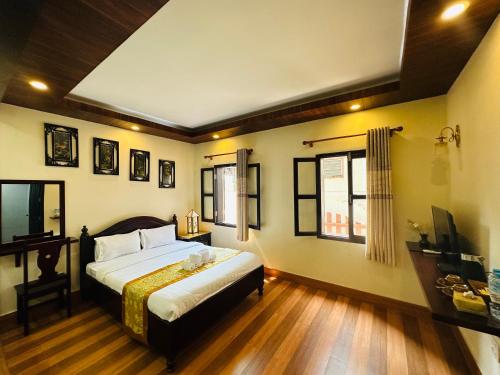 Guestroom, Luang Prabang Residence (The Boutique Villa) in Luang Prabang Guestroom, Luang Prabang Residence (The Boutique Villa) in Luang Prabang