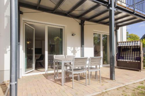 Erkély/terasz, moderne Ferienwohnung mit Saunanutzung - Residenz Waldidyll FeWo Steilküste (moderne Ferienwohnung mit Saunanutzung - Residenz Waldidyll FeWo Steilkuste) in Ostseebad Sellin Erkély/terasz, moderne Ferienwohnung mit Saunanutzung - Residenz Waldidyll FeWo Steilküste (moderne Ferienwohnung mit Saunanutzung - Residenz Waldidyll FeWo Steilkuste) in Ostseebad Sellin