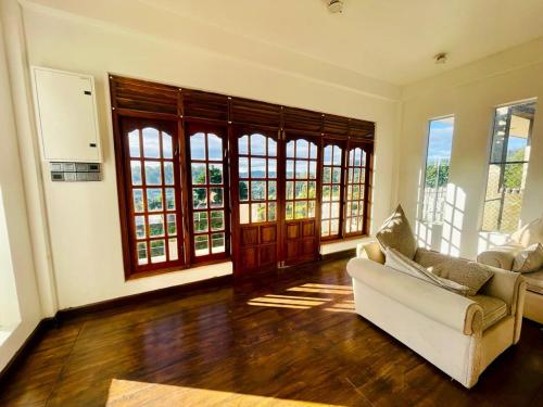 Vestíbulo, nuwaraelliya euphoria white house in Nuwara Eliya Vestíbulo, nuwaraelliya euphoria white house in Nuwara Eliya