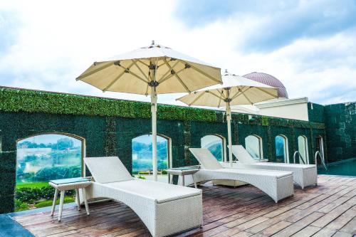 Swimming pool, Ramada Plaza by Wyndham Lucknow in Katibagiya Swimming pool, Ramada Plaza by Wyndham Lucknow in Katibagiya