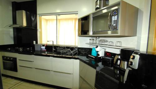 cuisine, 1072 - Apartamento 3 suítes Alto Padrão com SPA na Praia de Bombinhas (1072 - Apartamento 3 suites Alto Padrao com SPA na Praia de Bombinhas) in Bombinhas cuisine, 1072 - Apartamento 3 suítes Alto Padrão com SPA na Praia de Bombinhas (1072 - Apartamento 3 suites Alto Padrao com SPA na Praia de Bombinhas) in Bombinhas