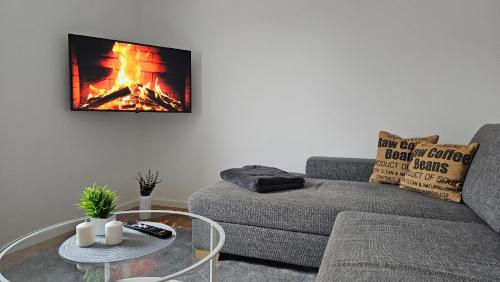 共用Lounge/電視區, Ferienwohnung AS5 One Bamberg - modern in ruhiger Lage mit Balkon in 哈爾斯塔特 共用Lounge/電視區, Ferienwohnung AS5 One Bamberg - modern in ruhiger Lage mit Balkon in 哈爾斯塔特