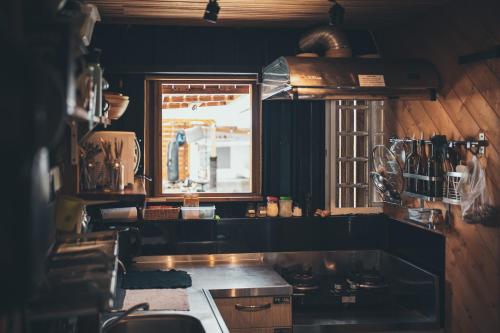 Zona de TV/saló-bar comuns, Slow Island Hostel in Green Island Zona de TV/saló-bar comuns, Slow Island Hostel in Green Island