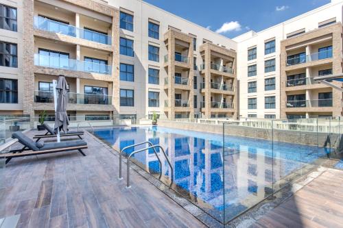 Swimming pool, Holiday Studio In JVC 0107, Dubai near Jumeirah Village Triangle Swimming pool, Holiday Studio In JVC 0107, Dubai near Jumeirah Village Triangle