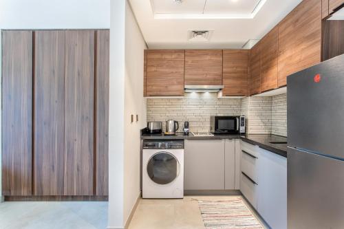 Kitchen, Holiday Studio In JVC 0107, Dubai near Jumeirah Village Triangle Kitchen, Holiday Studio In JVC 0107, Dubai near Jumeirah Village Triangle