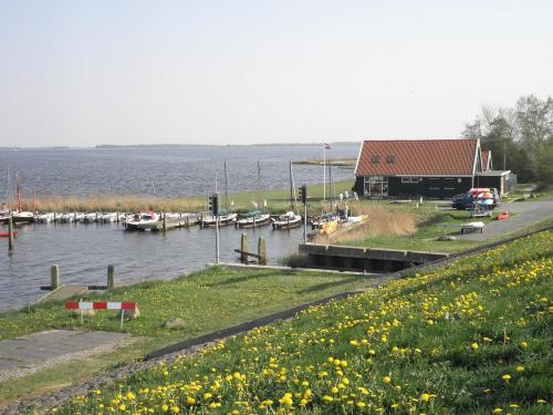 Entire house - 6 pers Sunny house with equipped terrace behind a dike at Lauwersmeer in Dongeradeel Entire house - 6 pers Sunny house with equipped terrace behind a dike at Lauwersmeer in Dongeradeel