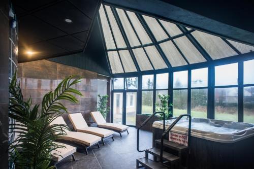 Фитнес зала, Holyrood Hotel - Leisure Centre & Escape Spa in Бундоран Фитнес зала, Holyrood Hotel - Leisure Centre & Escape Spa in Бундоран