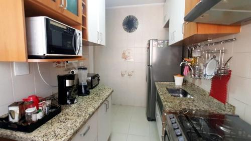 Kitchen, Seu aconchego em Guarulhos in Maia Kitchen, Seu aconchego em Guarulhos in Maia
