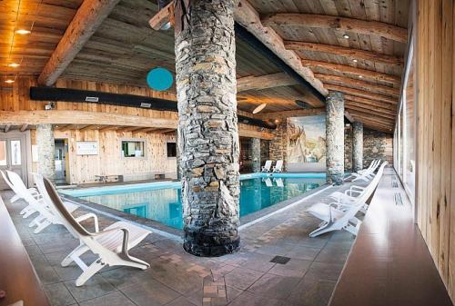 Kolam renang, Résidence Les Hauts Bois - maeva Home - Appartement 4 pièces 8 personnes Sélection MAE-9753 (Residence Les Hauts Bois - maeva Home - Appartement 4 pieces 8 personnes Selection MAE-9753) in La Plagne Kolam renang, Résidence Les Hauts Bois - maeva Home - Appartement 4 pièces 8 personnes Sélection MAE-9753 (Residence Les Hauts Bois - maeva Home - Appartement 4 pieces 8 personnes Selection MAE-9753) in La Plagne