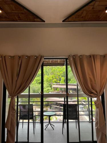Balcony/terrace, Bugana Beach and Dive Resort in Sipalay Balcony/terrace, Bugana Beach and Dive Resort in Sipalay