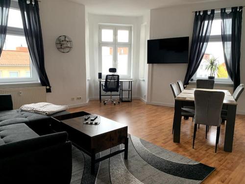sala de TV, Moderne Wohnung nahe Bahnhof und dem Goitzschesee in Bitterfeld-Wolfen sala de TV, Moderne Wohnung nahe Bahnhof und dem Goitzschesee in Bitterfeld-Wolfen