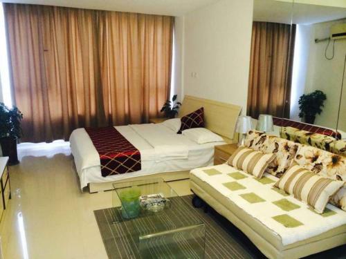 This photo about Wanda Gold Dragon Holiday Apartment shared on HyHotel.com