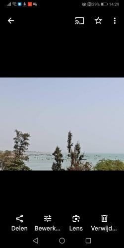 Maison Manour, chambre 'Tribal' in Mbour Maison Manour, chambre 'Tribal' in Mbour