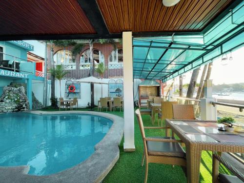 Swimming pool, Montani Beach Resort Puerto Galera powered by Cocotel near Sabang Wreck Swimming pool, Montani Beach Resort Puerto Galera powered by Cocotel near Sabang Wreck