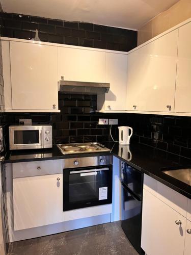 Kitchen, Ullet Suites in Garston Kitchen, Ullet Suites in Garston