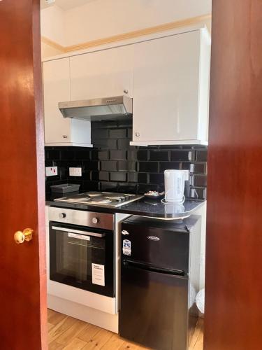 Kitchen, Ullet Suites in Garston Kitchen, Ullet Suites in Garston