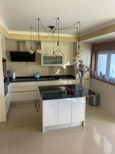 Kitchen, Welcoming house with terrace and garden in Barra de Mira in Praia Da Mira Kitchen, Welcoming house with terrace and garden in Barra de Mira in Praia Da Mira