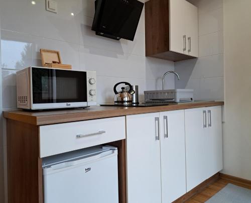 Noclegi Pod Modrzewiem in Powidz Noclegi Pod Modrzewiem in Powidz