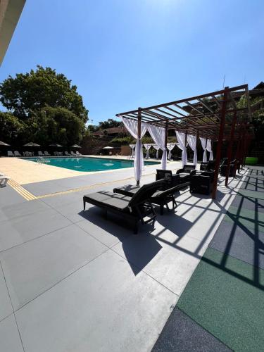 Terraza/balcón, Hotel Raices Esturion in Puerto Iguazú Terraza/balcón, Hotel Raices Esturion in Puerto Iguazú