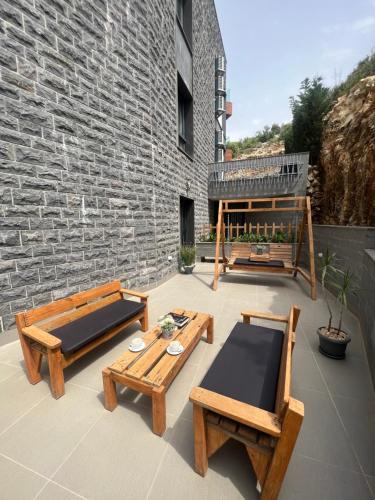 Balcony/terrace, Grey escape apartments in Hraiche Balcony/terrace, Grey escape apartments in Hraiche