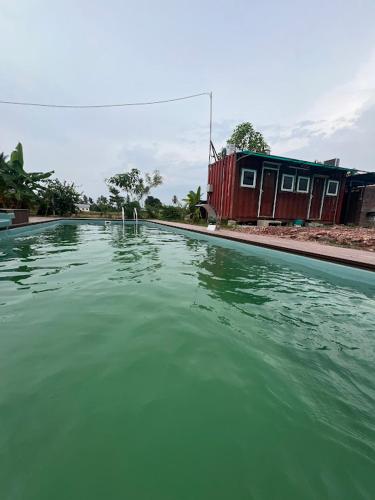 Swimming pool, OYO Home 90495 Homestay Kampung Kota Aur in Penaga Swimming pool, OYO Home 90495 Homestay Kampung Kota Aur in Penaga
