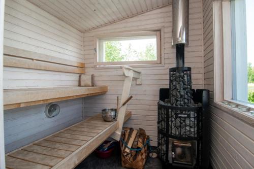 Сауна, House and guest house with sauna by the sea in Kristiinankaupunki Сауна, House and guest house with sauna by the sea in Kristiinankaupunki