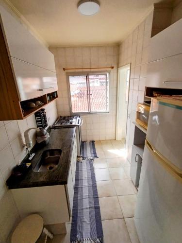 廚房, Apartamento Astúrias Guarujá (Apartamento Asturias Guaruja) in 普拉亞杜通布 廚房, Apartamento Astúrias Guarujá (Apartamento Asturias Guaruja) in 普拉亞杜通布