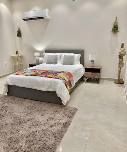 Elegant Garden Stay with 2 Living Areas, 2 Bedrooms, 1 Full and 1 Half Bath for 6 Guests in Sumaysimah Elegant Garden Stay with 2 Living Areas, 2 Bedrooms, 1 Full and 1 Half Bath for 6 Guests in Sumaysimah