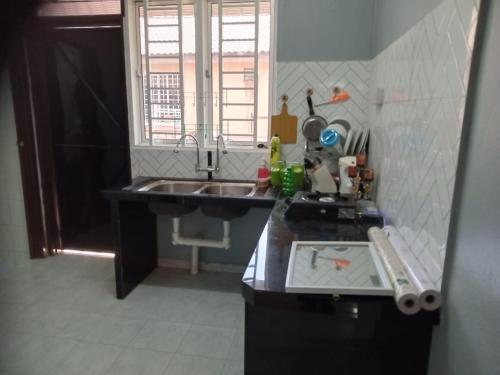 Ria Homestay & kolam in จิตรา Ria Homestay & kolam in จิตรา