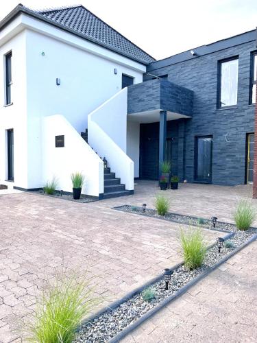 Зовнішній вигляд готелю, *75qm* Stilvolle Wohnung + Wärmekabine+Netflix (*75qm* Stilvolle Wohnung + Warmekabine+Netflix) in Пітерхаген Зовнішній вигляд готелю, *75qm* Stilvolle Wohnung + Wärmekabine+Netflix (*75qm* Stilvolle Wohnung + Warmekabine+Netflix) in Пітерхаген