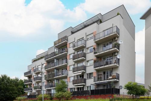 Podgórze Air-Conditioned Family Apartment with Parking by Noclegi Renters