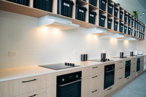 Kitchen, Capsuleaccom Hostel in Gold Coast Kitchen, Capsuleaccom Hostel in Gold Coast